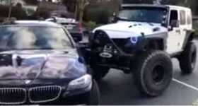 Jeep Pushes BMW 1