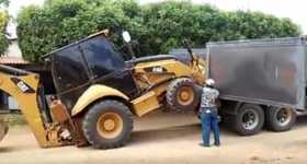 Park Dozer Cat 416 In A Truck Without A Ramp 1