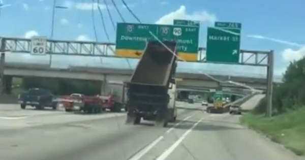 Dump Truck Driver Lifted Trailer Destroys Highway Signs crash 1